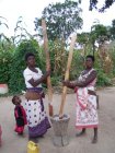 Makhua women crushing maize