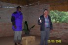 The Makhua Children's Bible is handed over by pastor Frits during Sunday service